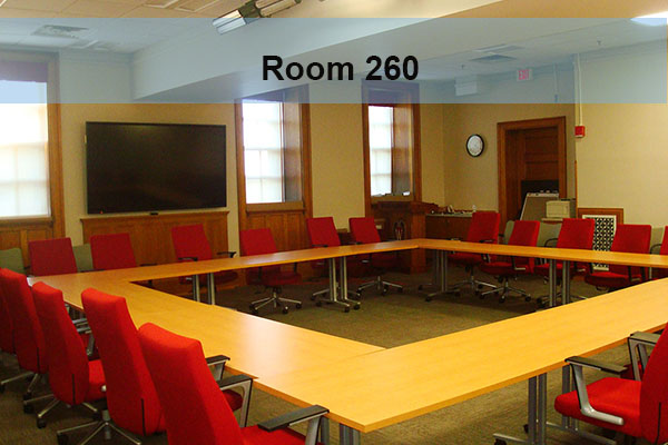 Large conference room with wall mounted monitor